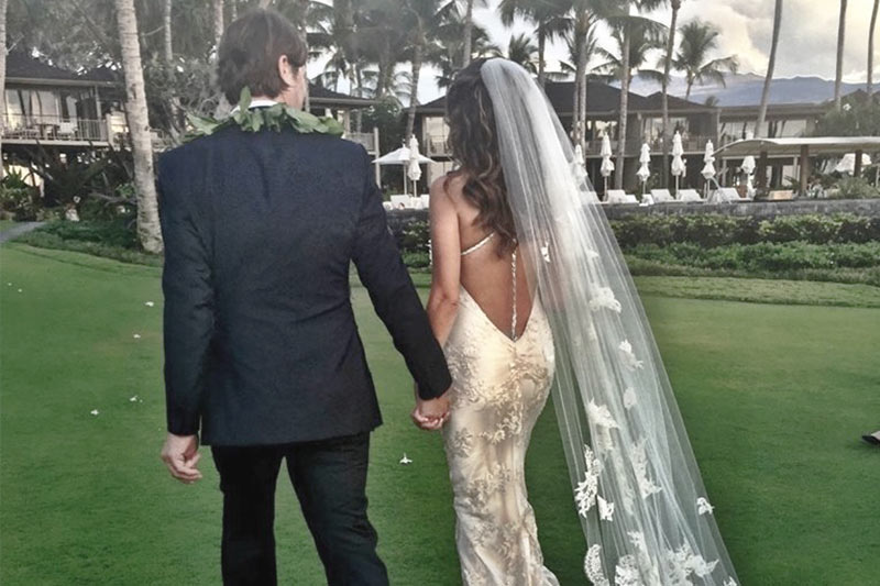 Bride and Groom on the Grass