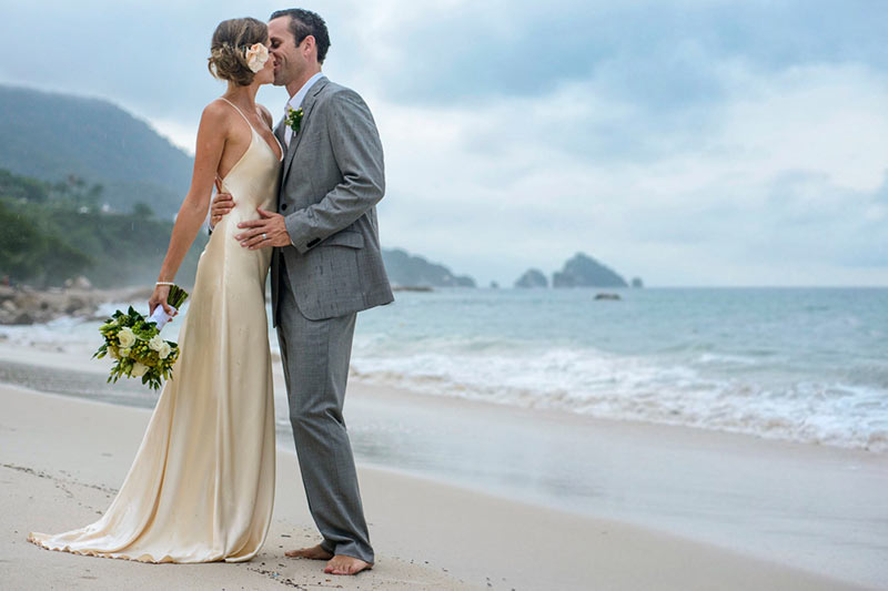 Married Couple Kissing on the Beach